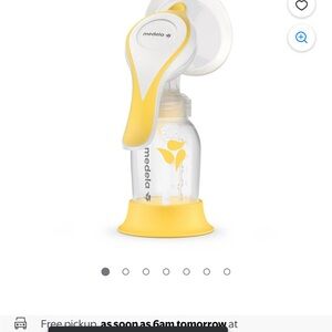 Medela Breast Pump with Yellow Highlights